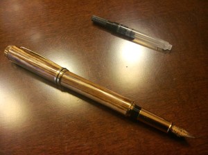 Baron Fountain Pen in Gold Titanium and Zebrawood.